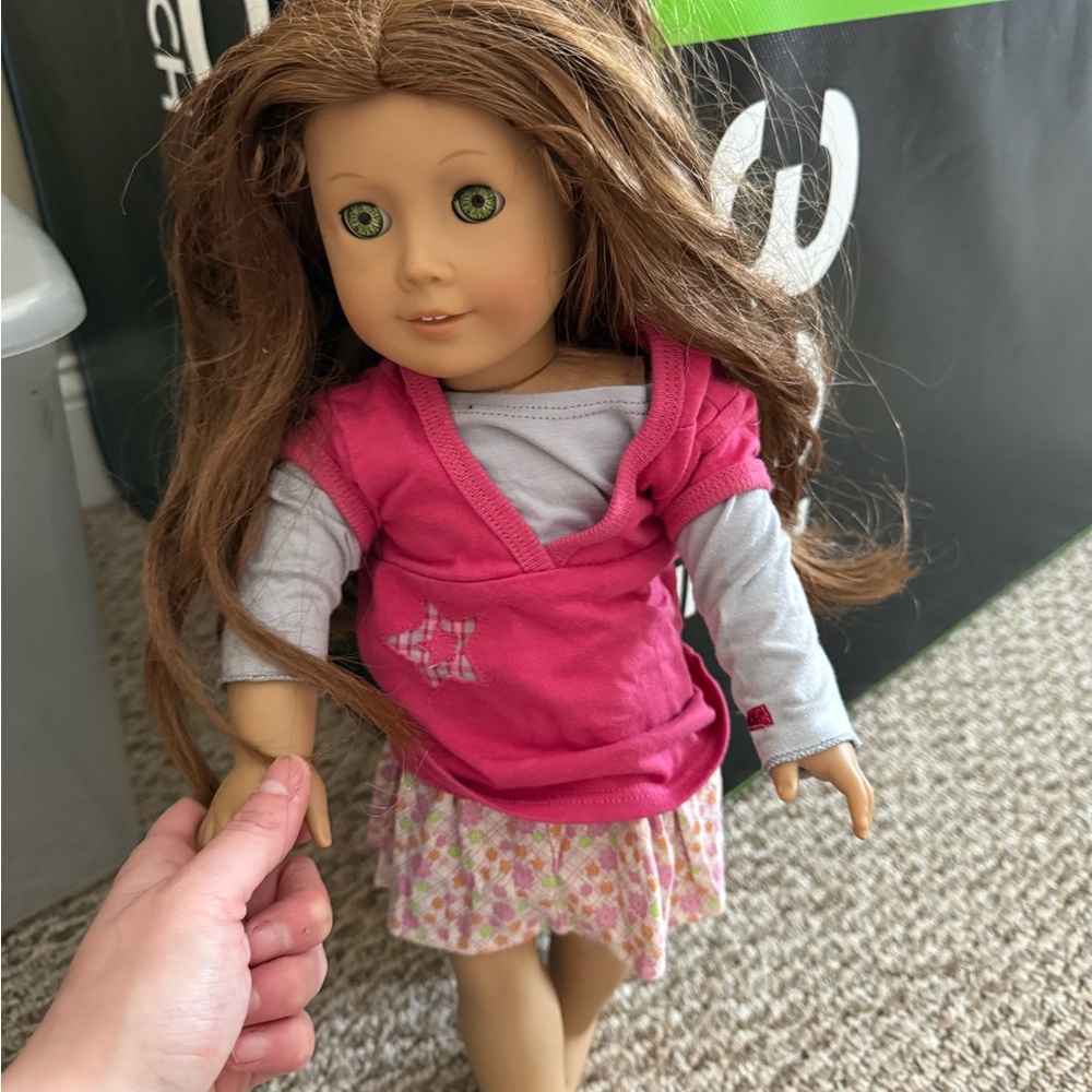 American Girl Doll with Pink Top and Long Brown Hair